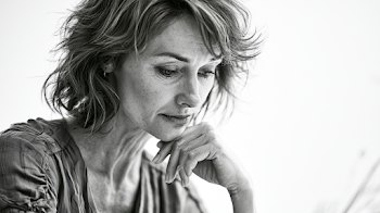 Confident Mature Businesswoman in Thoughtful Pose