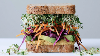 Delicious Stacked Vegetarian Sandwich with Fresh Vegetables