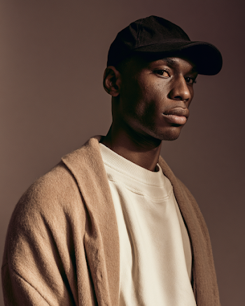 Dramatic Fashion Portrait of a Young Black Man in Modern Style