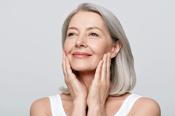 Elegant Mature Woman in Serene Skincare Pose