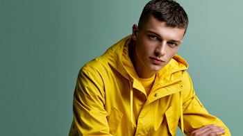 Futuristic Luxury Chic Male Fashion Model in Yellow Jacket