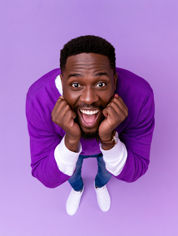 Joyful Young Black Man in Purple Sweater Portrait