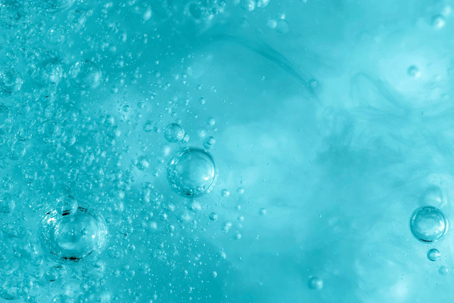 Abstract Macro Photograph of Air Bubbles in Turquoise Water