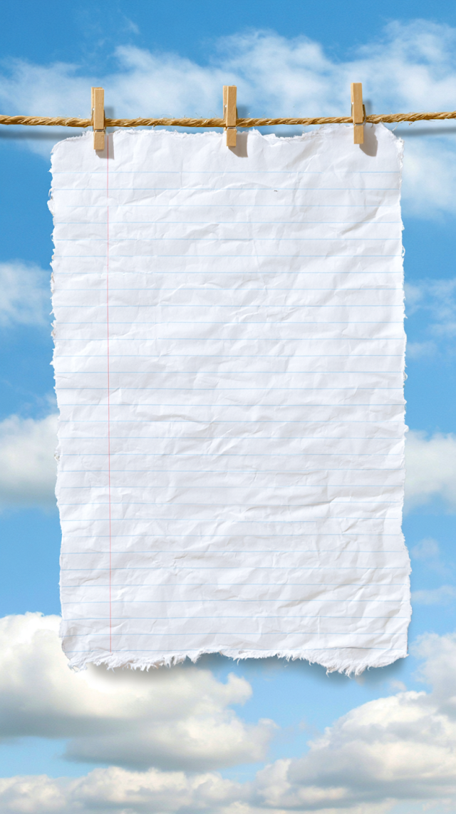 Blank Ruled Notebook Paper on a Jute Clothesline