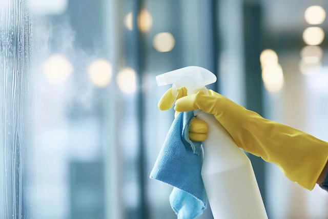 Close-Up of Cleaning Process with Yellow Gloves