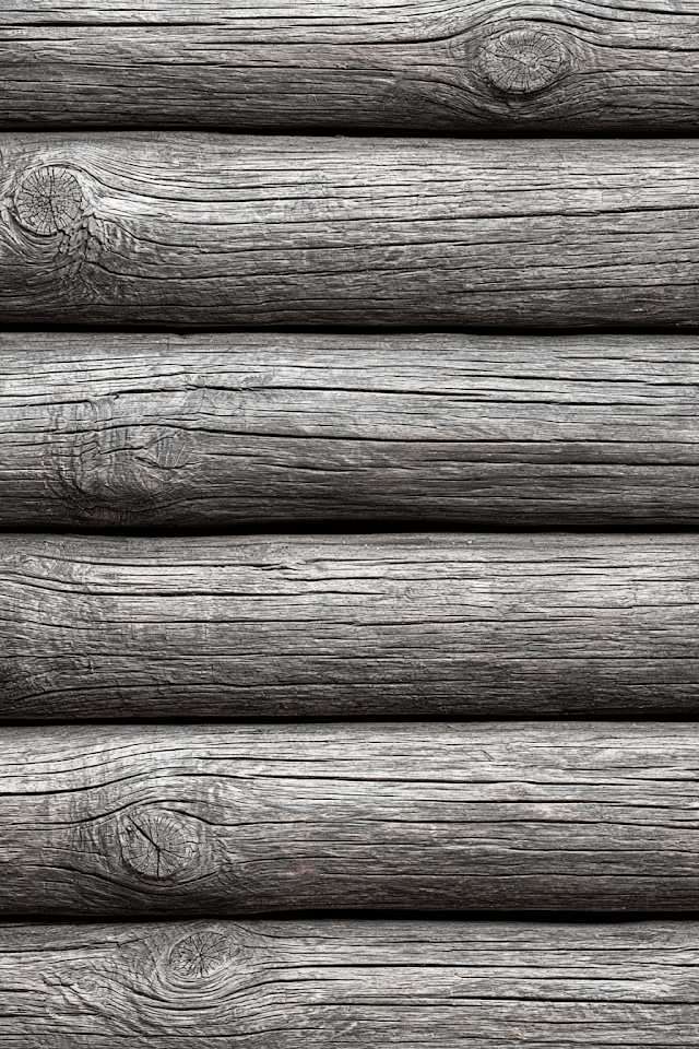 Close-Up of Weathered Log Cabin Wall Texture