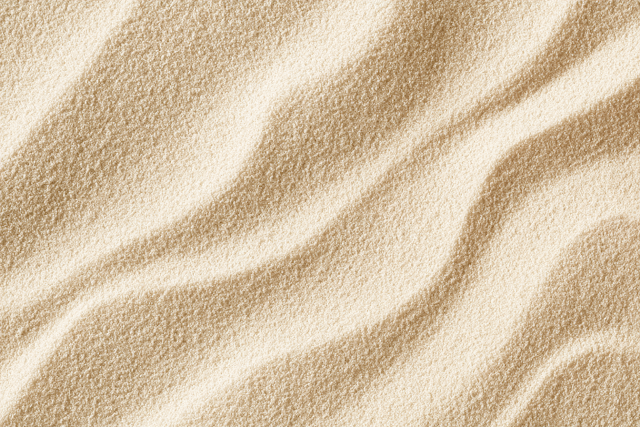 Close-up of Wind-Sculpted Beige Desert Sand