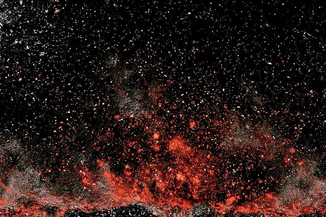 Cosmic Textured Surface with Glimmering Particles