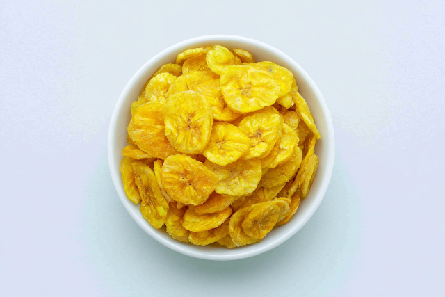 Crispy Banana Chips in White Ceramic Bowl