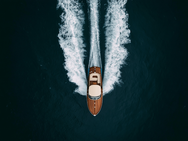Elegant Wooden Speedboat on Dark Teal Waters