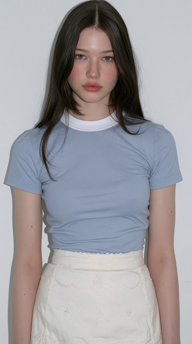 Elegant Young Woman in Soft Pastel Fashion Portrait