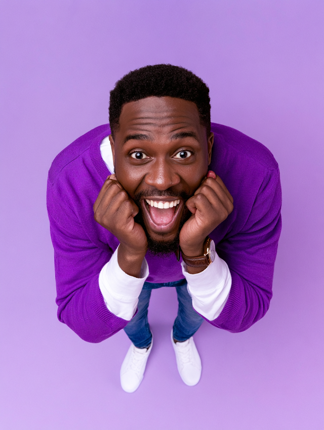 Joyful Young Black Man in Purple Sweater Portrait