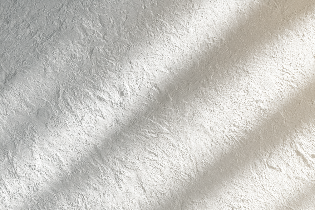 Luxury White Plaster Wall with Subtle Limewash Texture