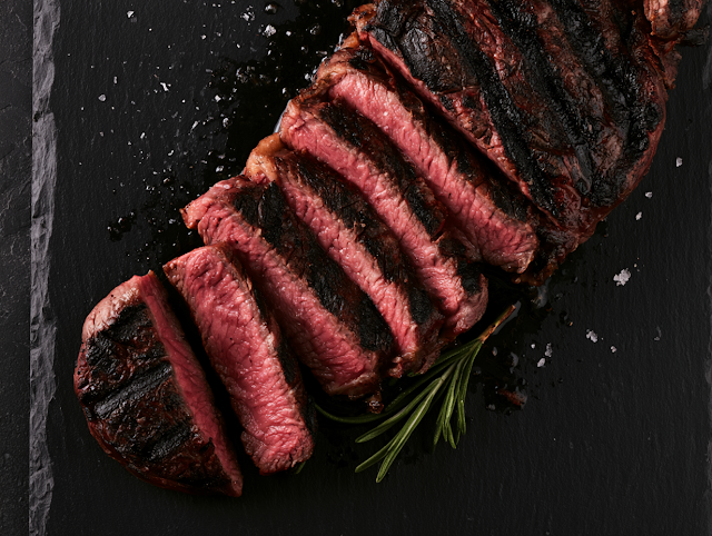 Perfectly Grilled Medium-Rare Steak with Rosemary