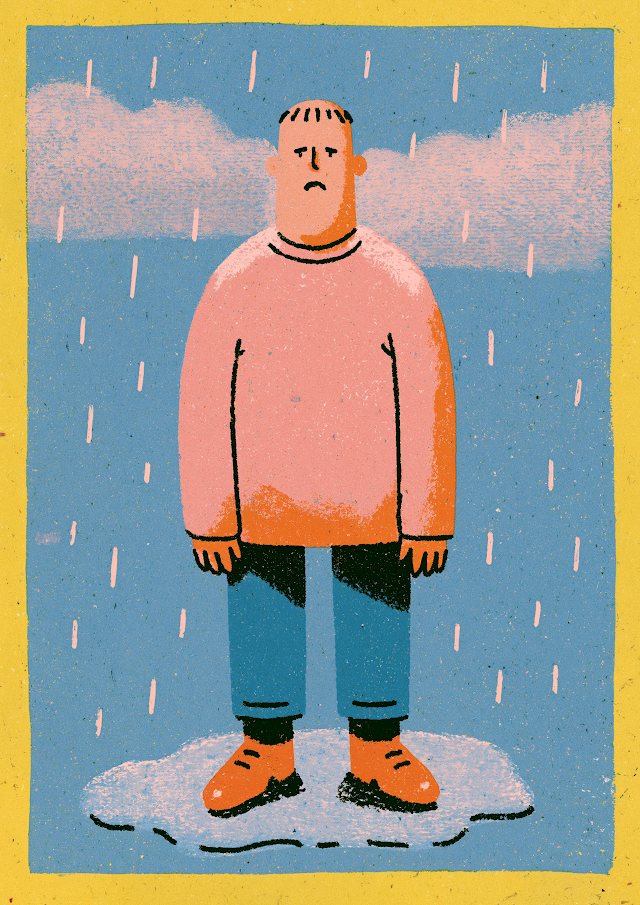 Sad Young Man Standing in the Rain