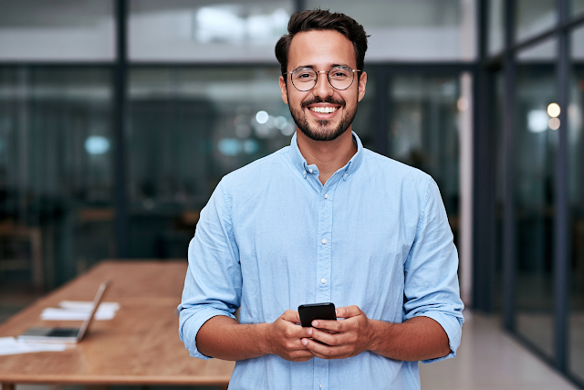 Smiling Young Professional in Modern Office