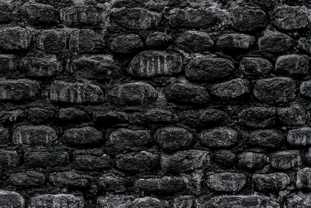 Weathered Black Stone Wall Texture