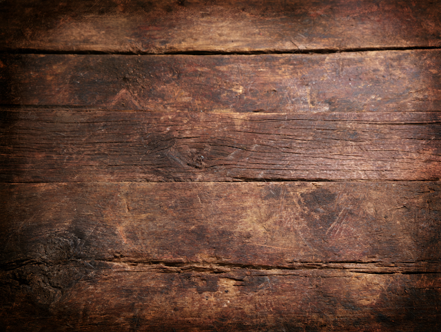 Weathered Dark Brown Wooden Surface Texture